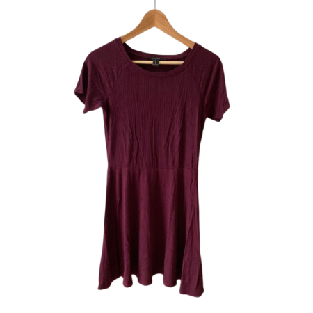 A maroon dress hanging on a hanger.