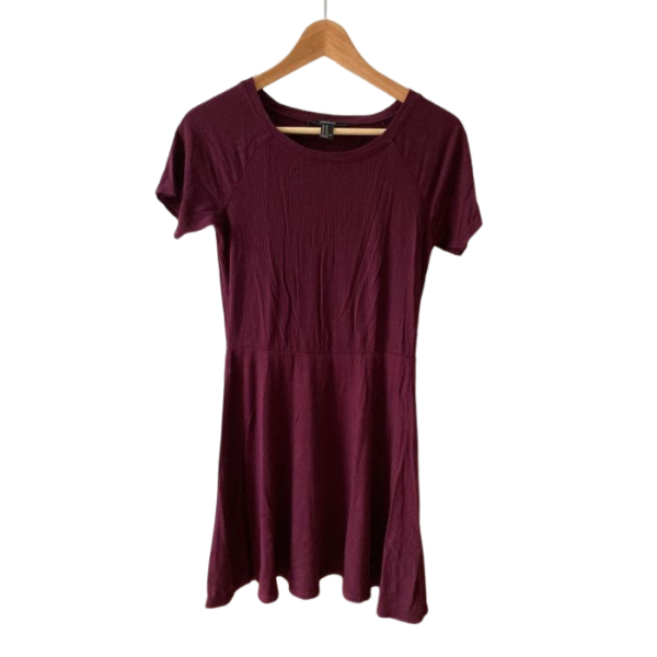 A maroon dress hanging on a hanger.
